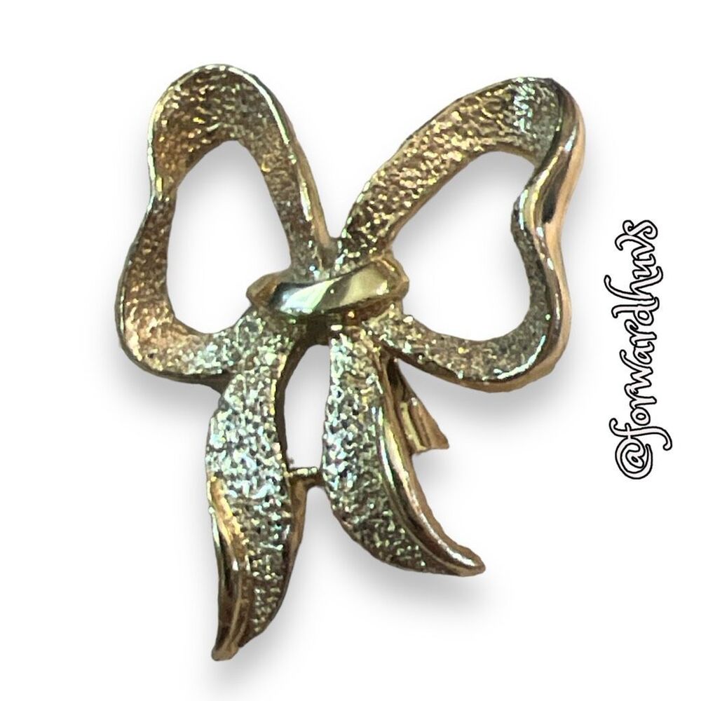 Gerry Gold Tone Bow Brooch